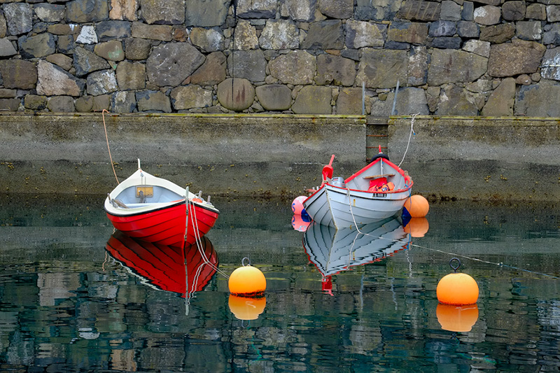 Moored boats in a secluded little harbour - Fuji XE-1 with 55-200mm lens - in cam velvia jpeg
